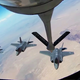Illustration for article titled Watch This Gaggle Of F-35s Chug Gas From A KC-135 High Over Arizona